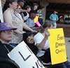 photo of protesters at Carr hearing