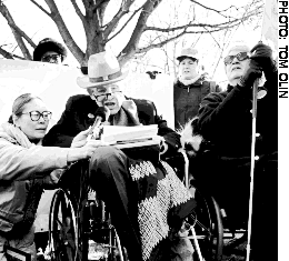 Image: Justice For All's Yoshiko Dart and Justin Dart; Mary Jane Owen of 

the National Catholic Office for Persons with Disabilities.