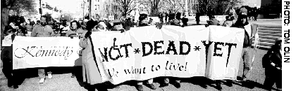 Image: Not Dead Yet marches at the Supreme Court