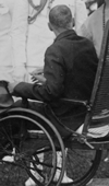 man in wheelchair looking up